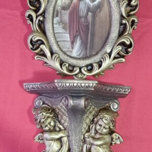Cuadro y repisa de ángeles